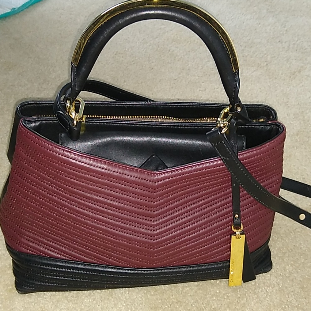 Bag, Vince Camuto. Black & burgundy